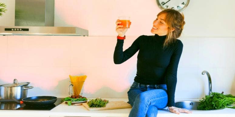 3 Tips On How To Boost Your Immune System For This Fall woman eating healthy in order to boost immune system