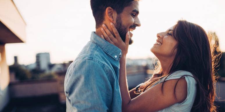 The Phrase You Must Use If You Want A Lasting Relationship man and woman embracing and laughing