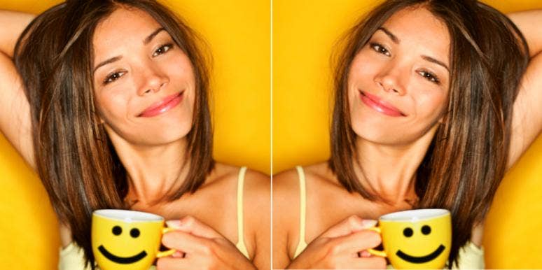 woman smiling coffee cup