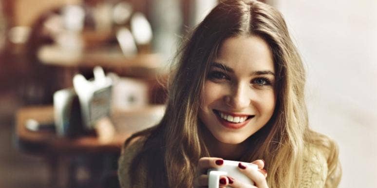 smiling woman experiencing past life regression smiling woman experiencing past life regression