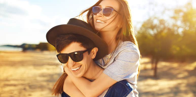 In The Pursuit Of Romance: Why Girls Should Pursue The Guy couple outside wearing sunglasses