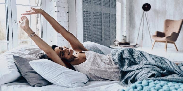 how sleep debt affects your health woman waking up in the morning