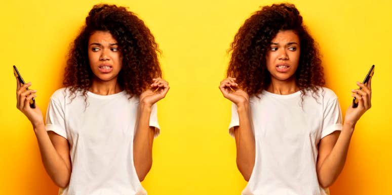 How To Apologize For Ghosting Someone woman looking at her phone not wanting to answer