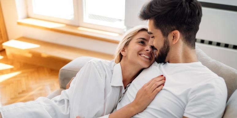 The 2 Things Every Good Wife Does For Her Husband woman cuddling with man