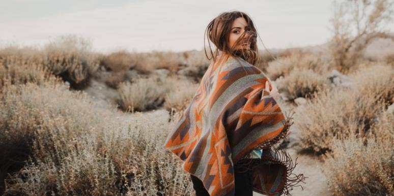 7 Amazing Things I’ve Been Able To Experience Because I’m Single happy woman in field