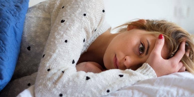 how to be more creative woman lying in bed
