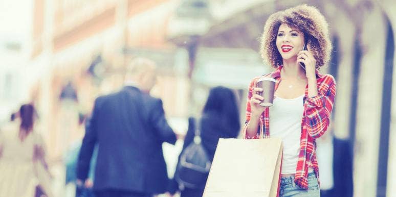 how to create work-life balance woman on the phone with shopping bags