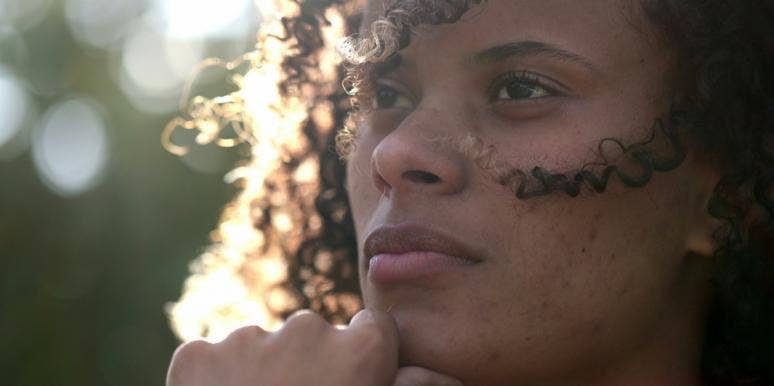 3 Ways To Develop & Strengthen Intuition, According To A Psychic Medium woman thinking