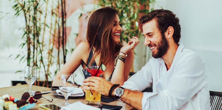 3 Surprising Flirting Tips That Will Make Him Crave You man and woman on dinner date