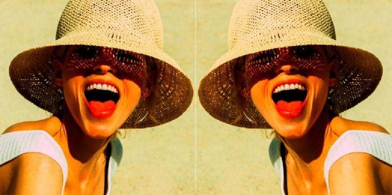 mirror image of woman in hat with her mouth open