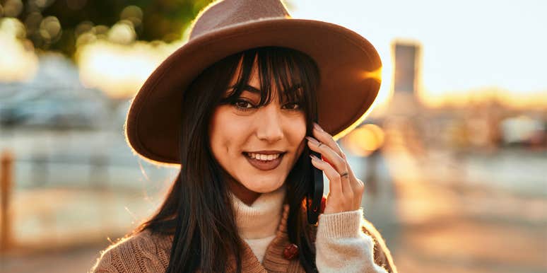 woman with bangs smiling