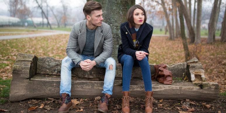 how to have a healthy relationship solemn couple sitting on bench