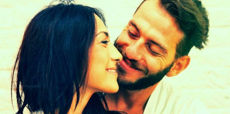 How To Keep A Man Faithful & Stop Him From Cheating man and woman smiling looking at each other