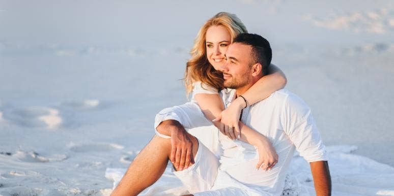 Answering These 14 Questions Will Tell You For Sure If He's 'The One' woman cuddling man