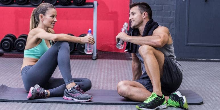 how to meet someone at the gym man and woman at the gym talking