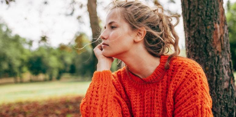 How To Move On From Living In The Past & Stop Ruminating On Mistakes & Guilt woman thinking