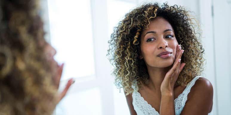 How To Perform A Self-Exam At Home & 5 Health Checks You Can Do Yourself woman checking face