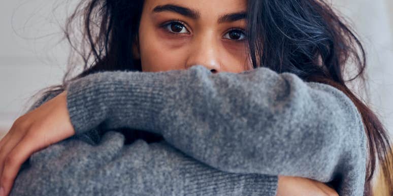 woman with anxiety looking at the camera