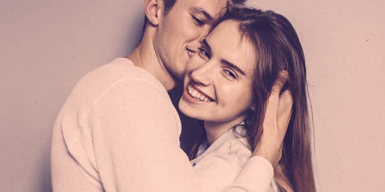 How To Stroke A Man's Ego couple hugging