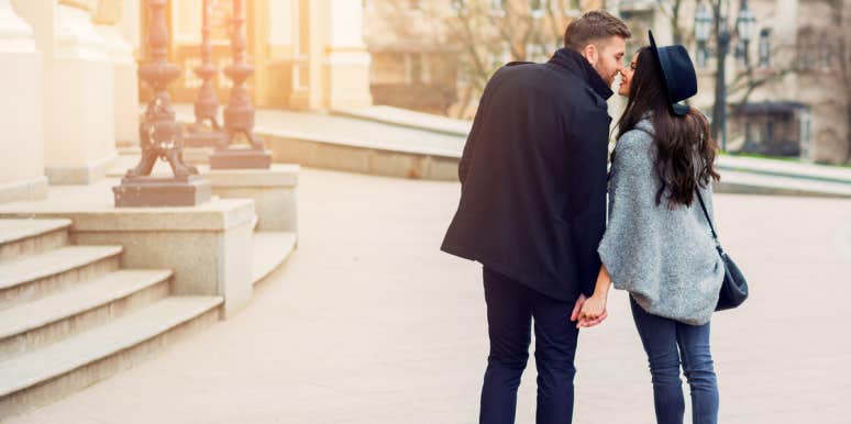 The Fail-Proof Way To Tell If A Guy Really Likes You man kissing woman