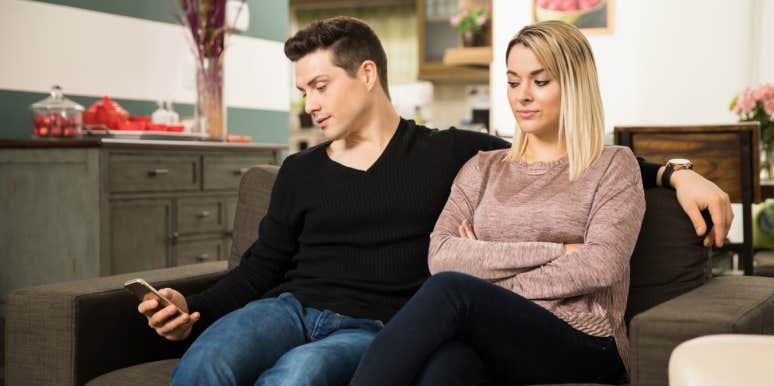 How To Find Out If A Man Is Hiding Something From You (Without Getting Caught) man sneakily texting