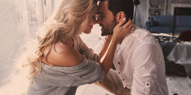 How To Tell If You're His "Mrs. Right" Or Just "Mrs. Right Now" couple about to kiss