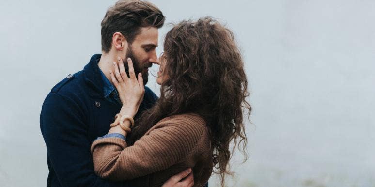 This Simple Test Will Reveal If Your Relationship Is Healthy — Or If It's Time To Break Up man and woman embracing