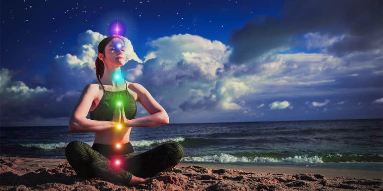 How To Unblock Your Chakras: A Complete Guide For Healing woman meditating chakras
