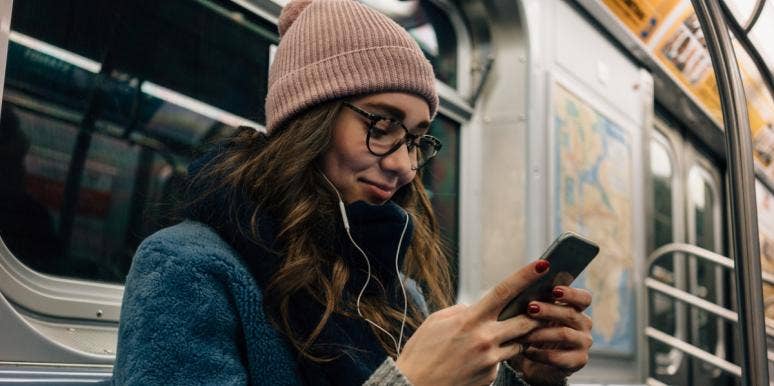 woman looking at phone woman looking at phone