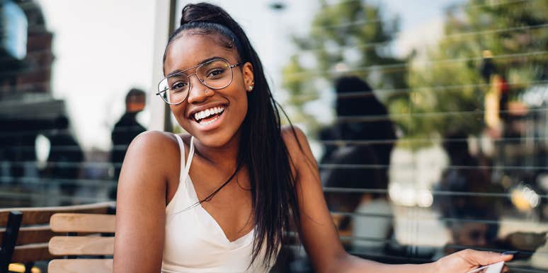How You Can Train Your Brain To Be Blissfully Happy In Seconds smiling woman