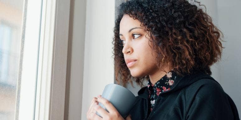human connection woman looking out the window