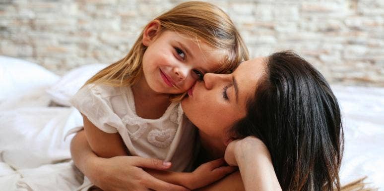 Yes, I Call My Kids Assholes. Why? Because They're Assholes mom kissing daughter