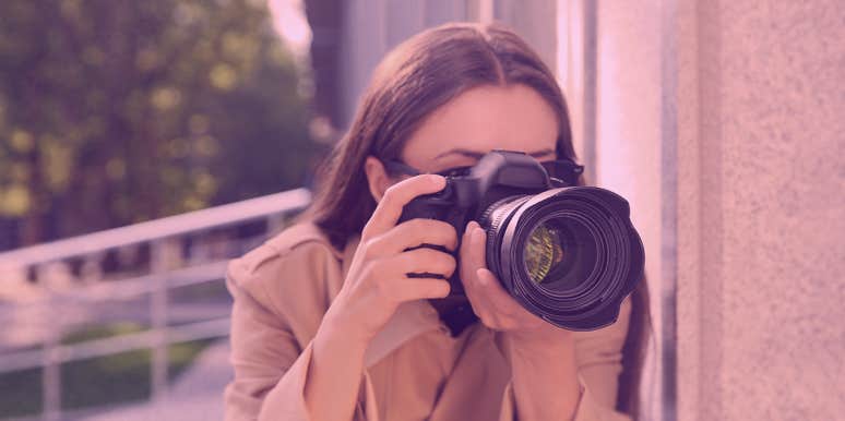 I Get Paid Big Bucks To Spy On Cheating Husbands For A Living woman holding camera to take picture