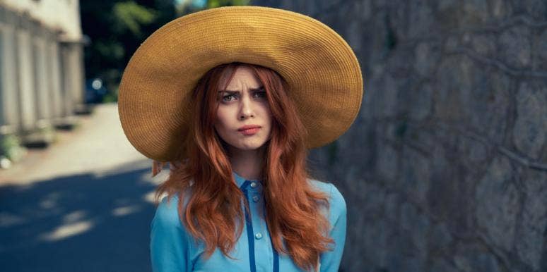 I have no friends unhappy woman in a hat