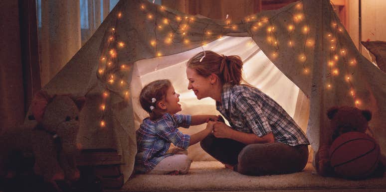 I Lived In A 600-Sq-Ft Apt Just So I Could Stay Home With My Kids mom and child, in a tent at home