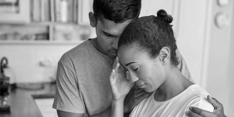 I Refuse To Let My Wife's Depression Ruin Our Marriage husband comforting sad wife