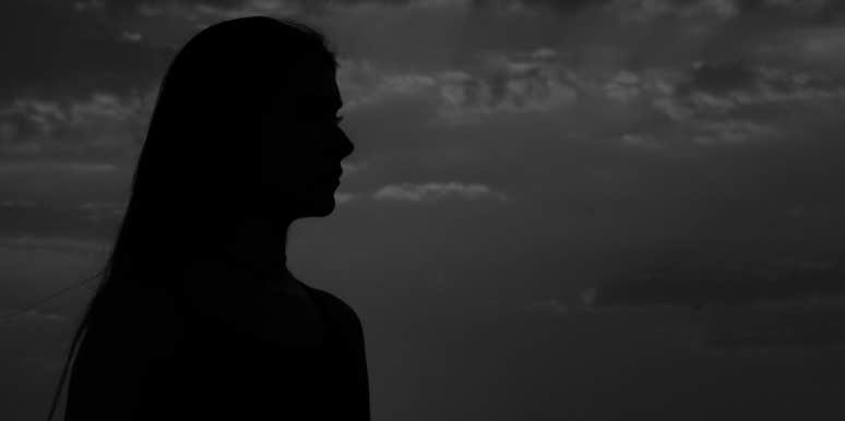 woman alone in the dark