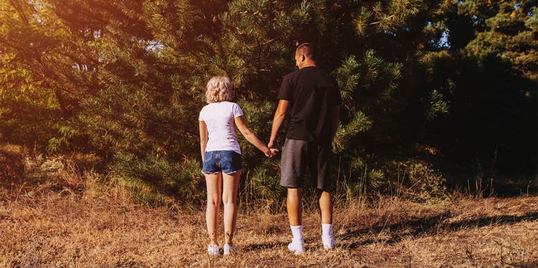 If Tall Guys Are Your Type, We Have Really Depressing News tall guy holding hands with short girl