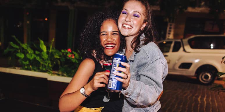 two women friends laughing