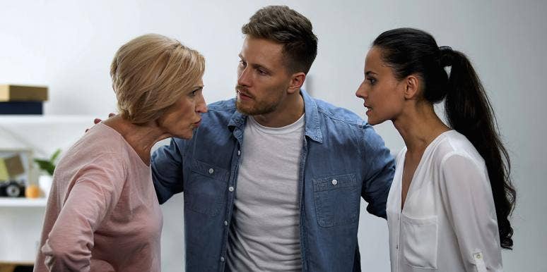 13 Things Your Mother-In-Law Secretly Thinks About Your Marriage couple with mother-in-law