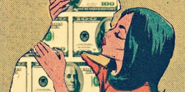girl kissing money