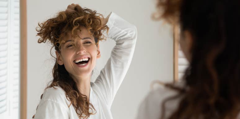 This Is The Last Thing You Should Ever Judge Yourself By woman goofing around and having fun