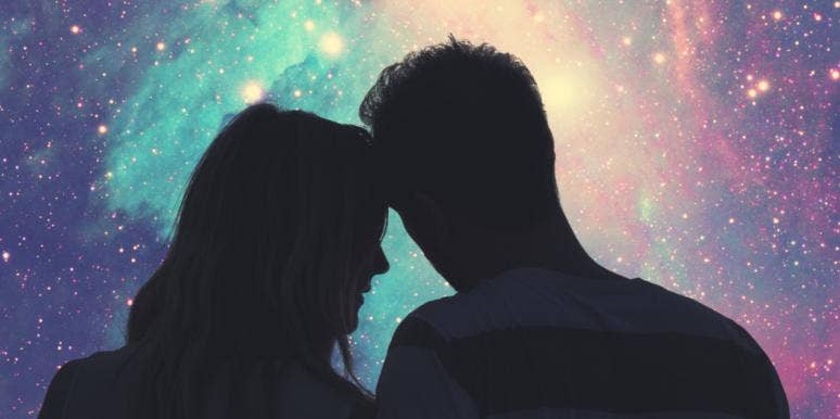 Karmic Relationships In Astrology, Explained By Zodiac Sign couple under the stars