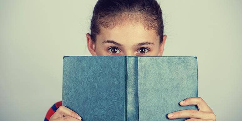 5 Ways You Unintentionally Ruin Your Kids And Self-Confidence kid reading a book