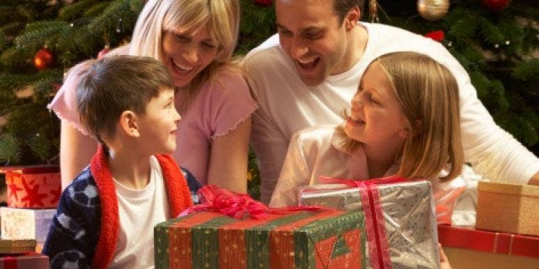 Kids opening Christmas gifts Kids opening Christmas gifts