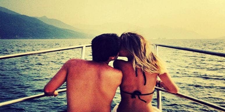 couple kiss on vacation couple kiss on vacation