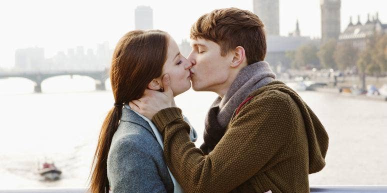 5 Signs You're A Bad Kisser (And How To Make It Better) couple kissing outside