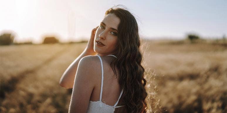 The 'Law Of Attraction' Rule Only The Happiest People Know woman smiling