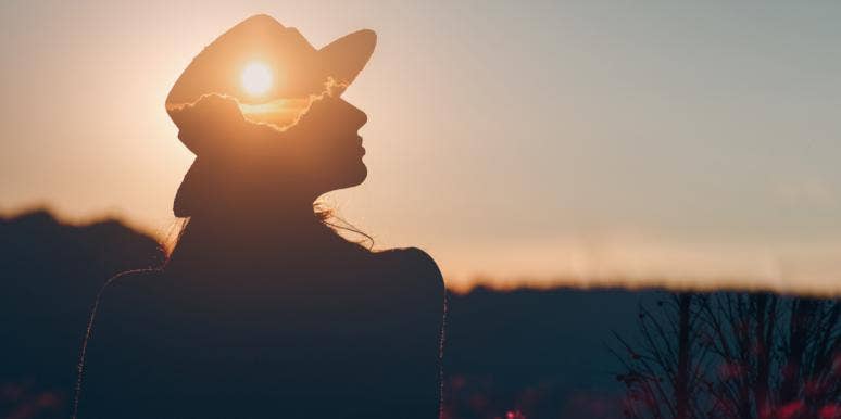 How Well Do You Listen To Your Intuition? Take Our Quiz + Find Out! woman in sunset