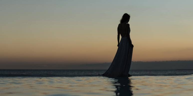 What I Did When The Love Of My Life Left Without A Warning woman walking by water